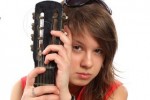 girl musician playing guitar